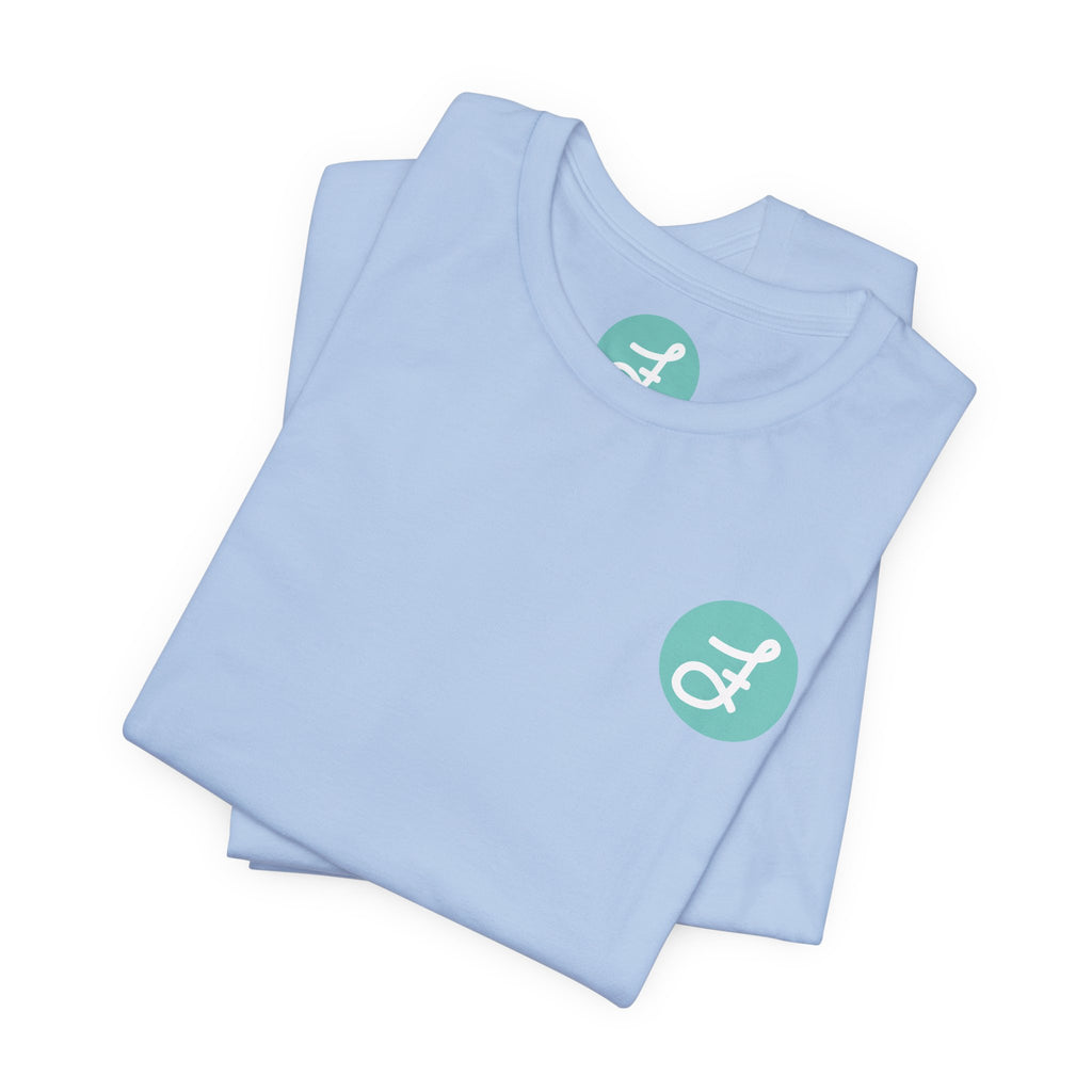 Frannie's Coffee Princeton, BC t-shirt in Baby Blue: folded, showing the F logo and printed neck label