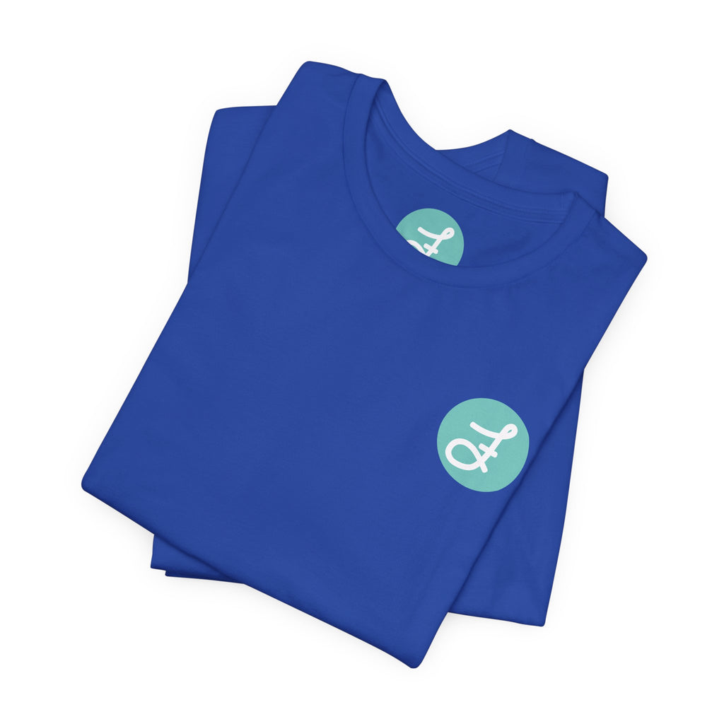 Frannie's Coffee Princeton, BC t-shirt in True Royal: folded, showing the F logo and printed neck label