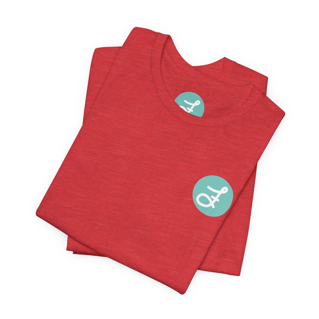 Frannie's Coffee Princeton, BC t-shirt in Heather Red: folded, showing the F logo and printed neck label