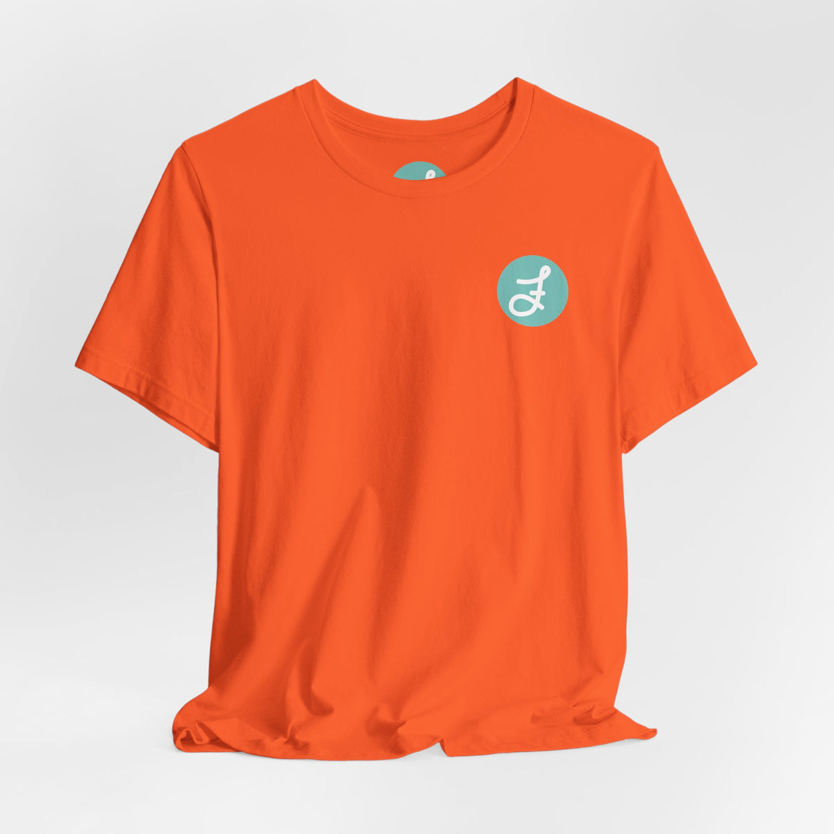 Frannie's Coffee Princeton, BC t-shirt in Orange: front with the F logo on the left chest