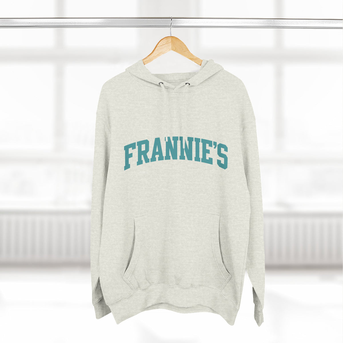 Frannie's varsity hoodie in Oatmeal Heather: on a hanger