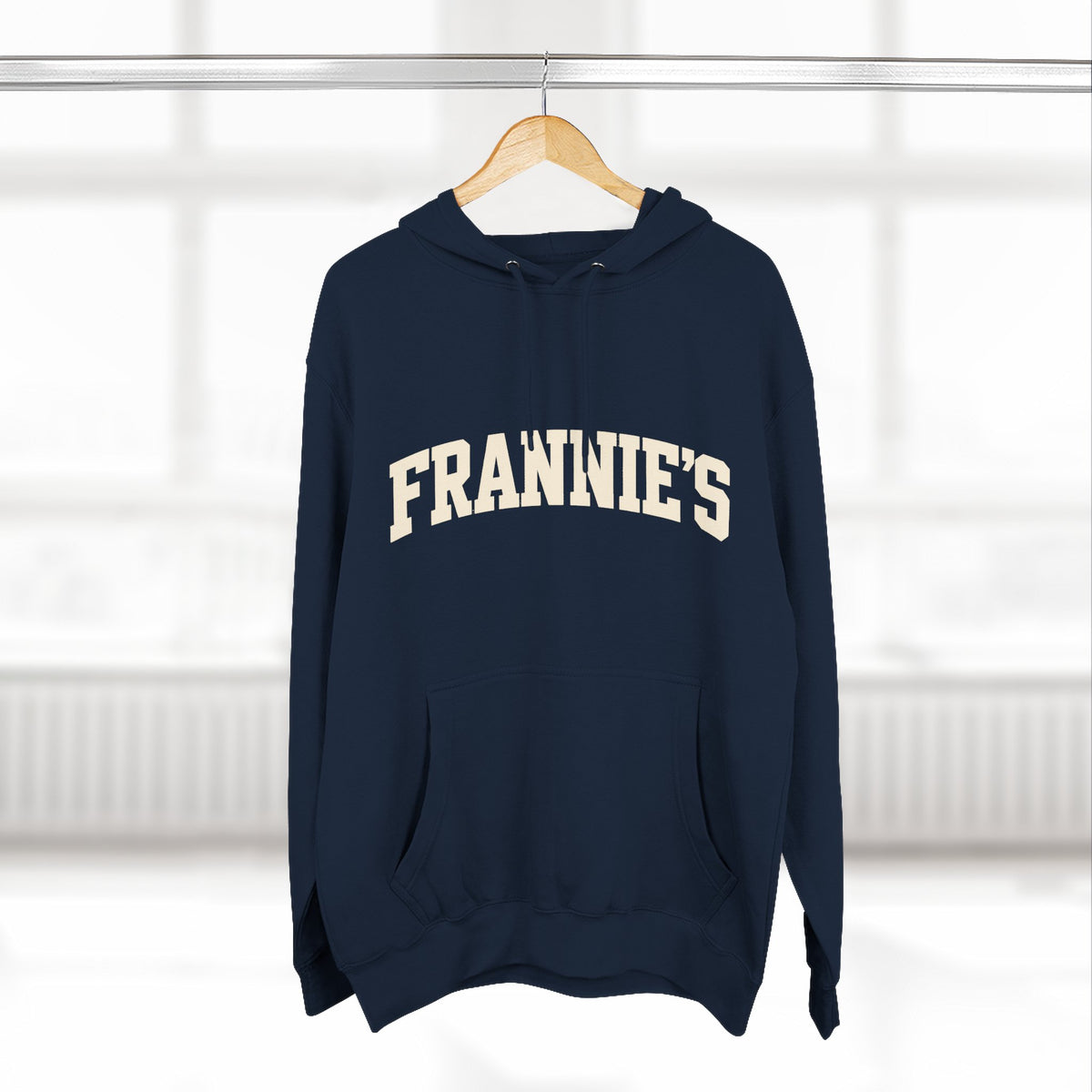 Frannie's varsity hoodie in Navy: on a hanger