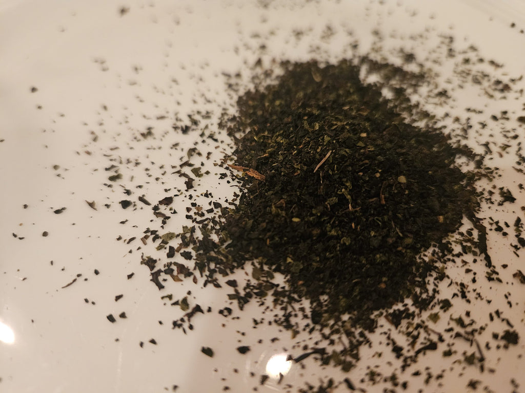 Double Cream of Earl Grey loose tea leaves on a white plate