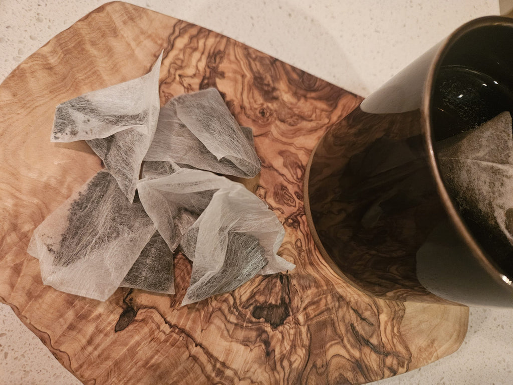 Tulameen Breakfast tea bags beside a dark mug