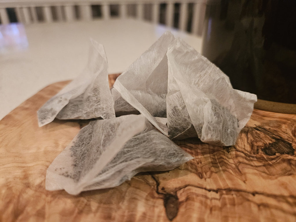 Tulameen Breakfast pyramid tea bags on a wooden board