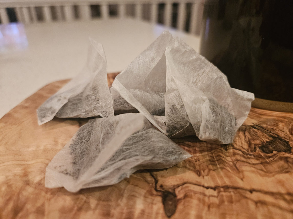 Tulameen Breakfast pyramid tea bags on a wooden board