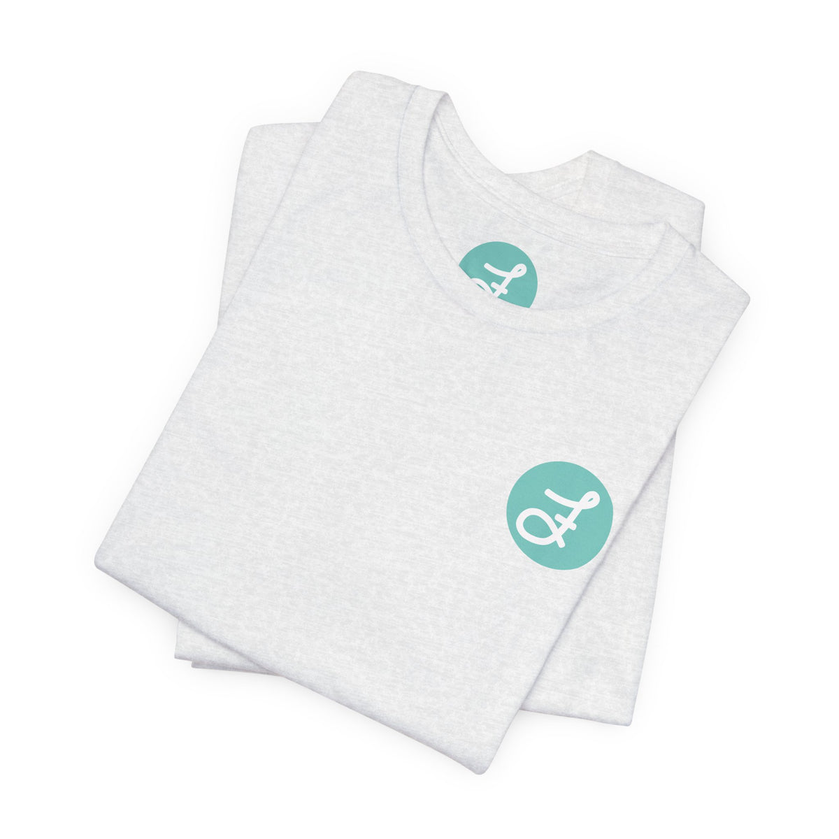 Frannie's Coffee Princeton, BC t-shirt in Ash: folded, showing the F logo and printed neck label