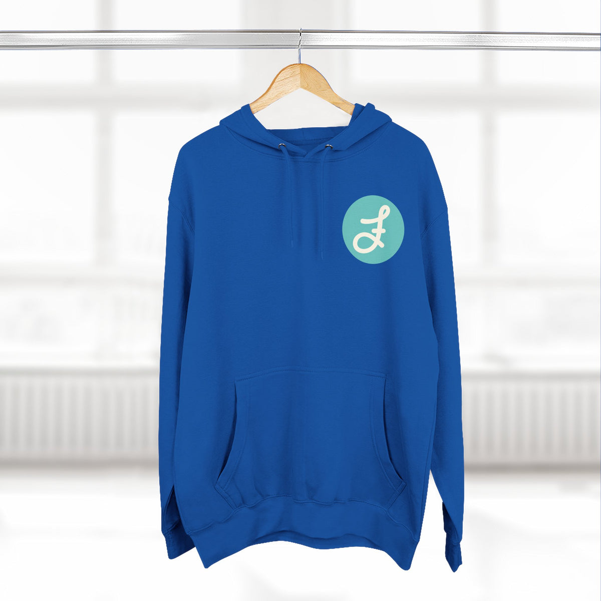 Frannie's Coffee logo hoodie in Royal Blue: on a hanger