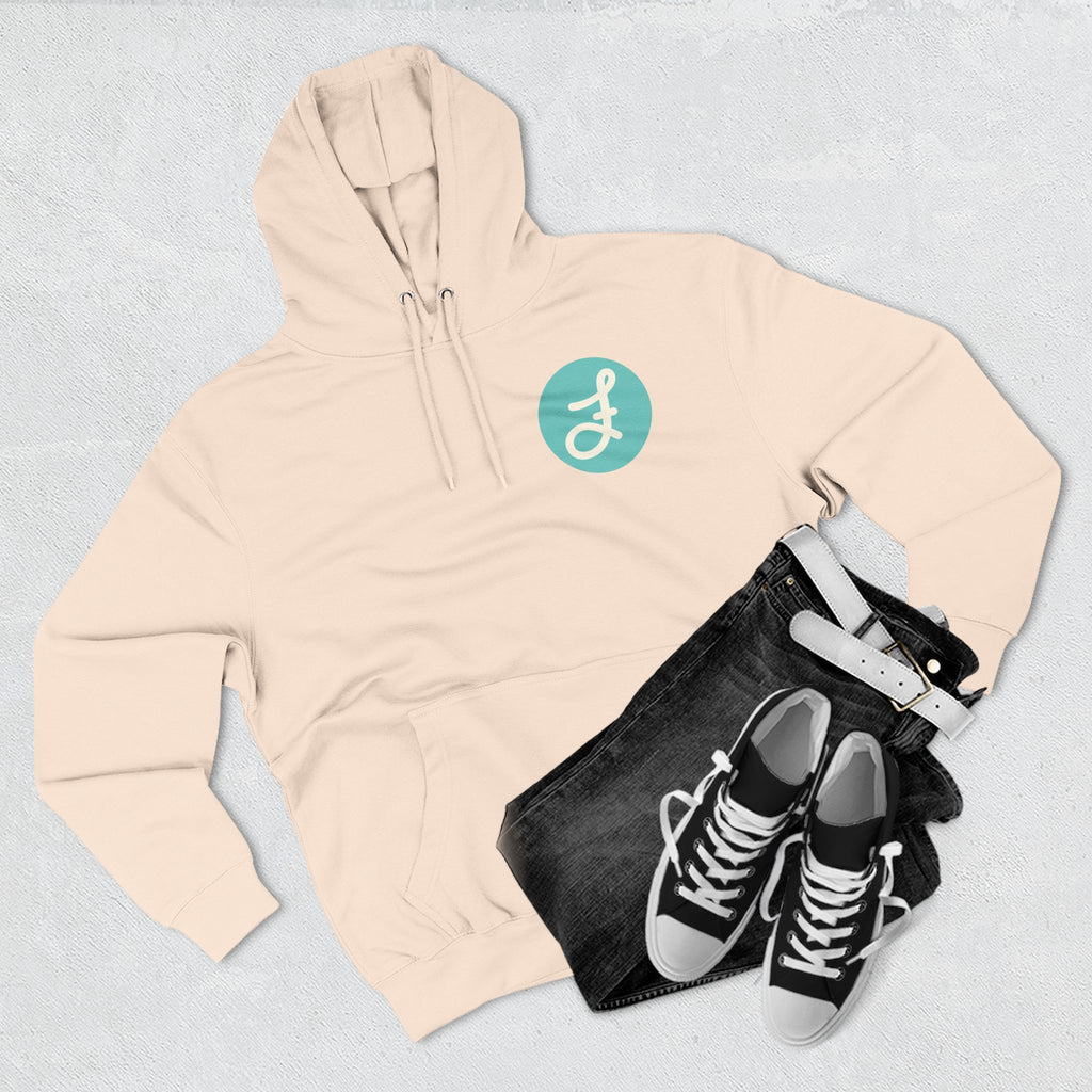 Frannie's Coffee logo hoodie in Pale Pink: laid flat with jeans and sneakers