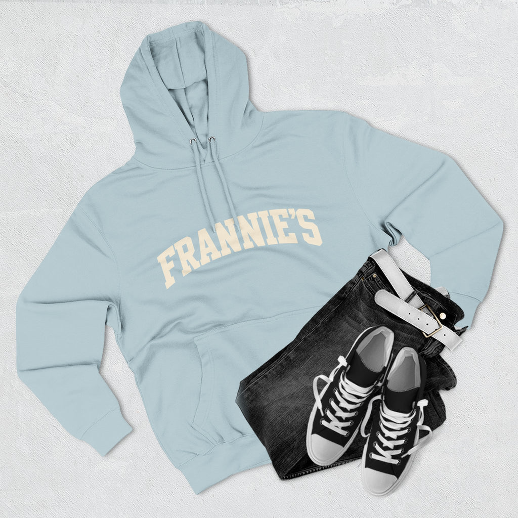 Frannie's varsity hoodie in Blue Mist: laid flat with jeans and sneakers
